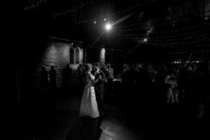 a couple share their first dance at their cottiers theatre wedding