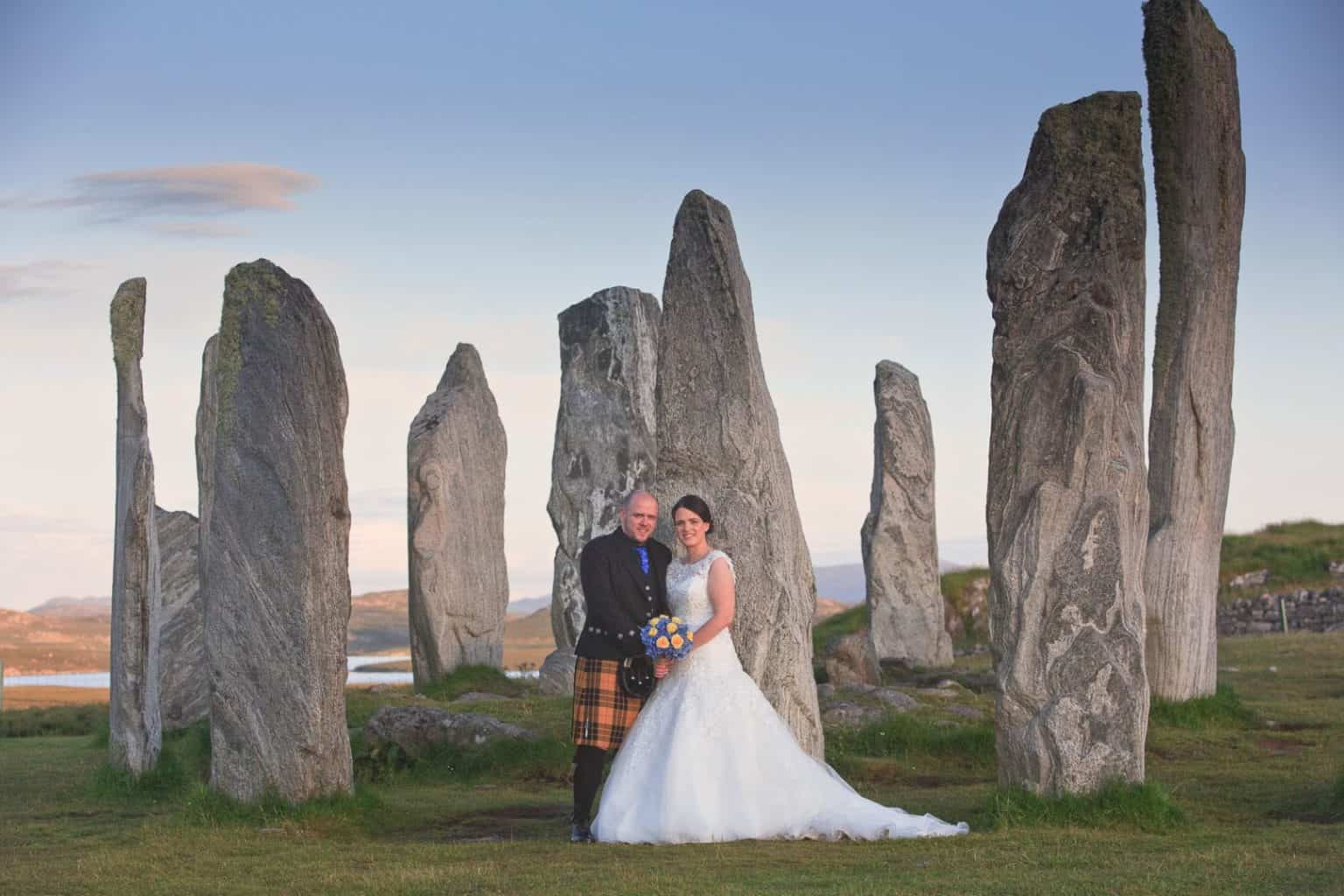 callanish-stones-wedding-photograph a wedding couple photographed at the callanish stones on the isle of lewis