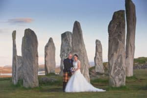a wedding couple photographed at the callanish stones on the isle of lewis