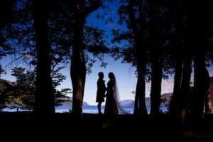 silhouette wedding photograph of a bride and groom on their scottish elopement at loch ness