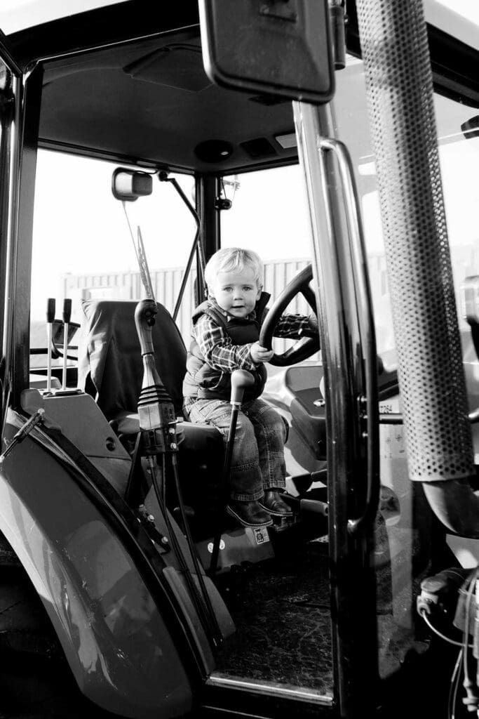 boy-riding-a-tractor-family-photo